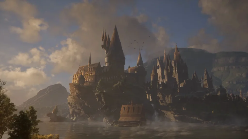 Hogwarts Castle overlooking lake at sunset in Harry Potter