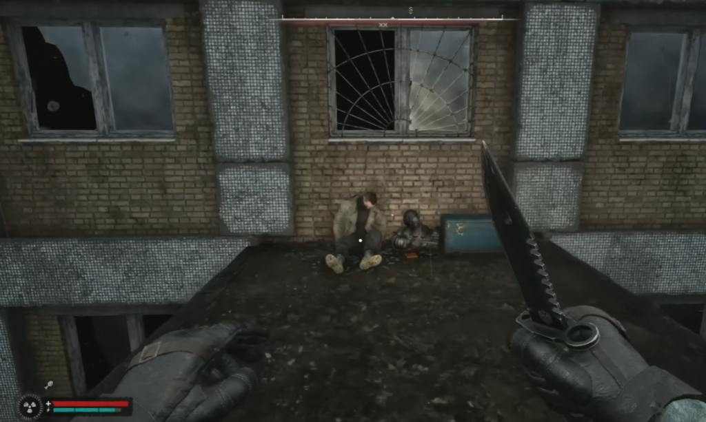First-person knife view on rooftop ledge