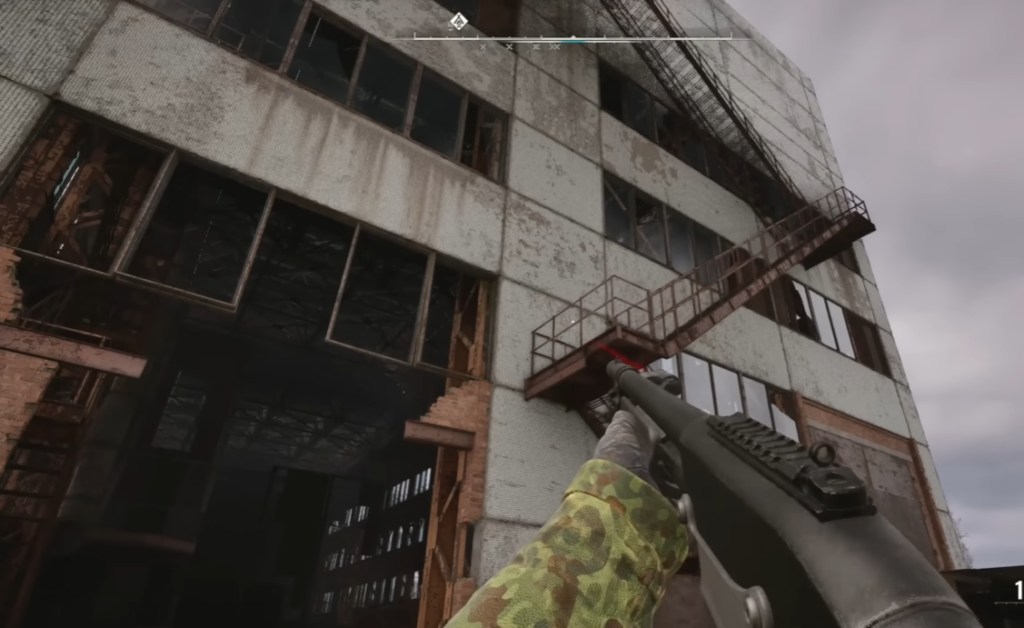 First-person aiming shotgun at factory building