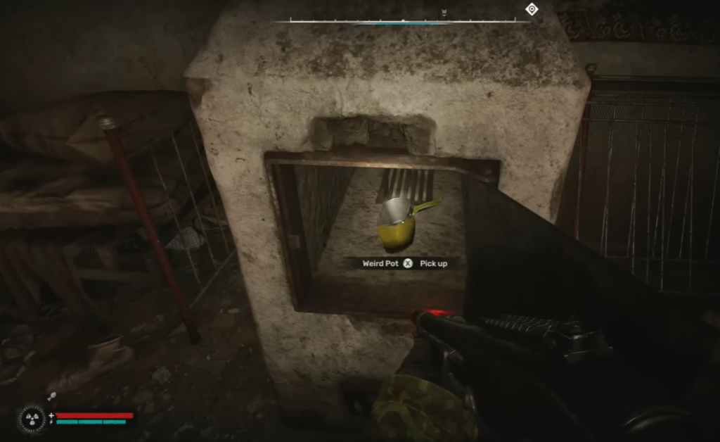 Player aiming gun at pot in oven