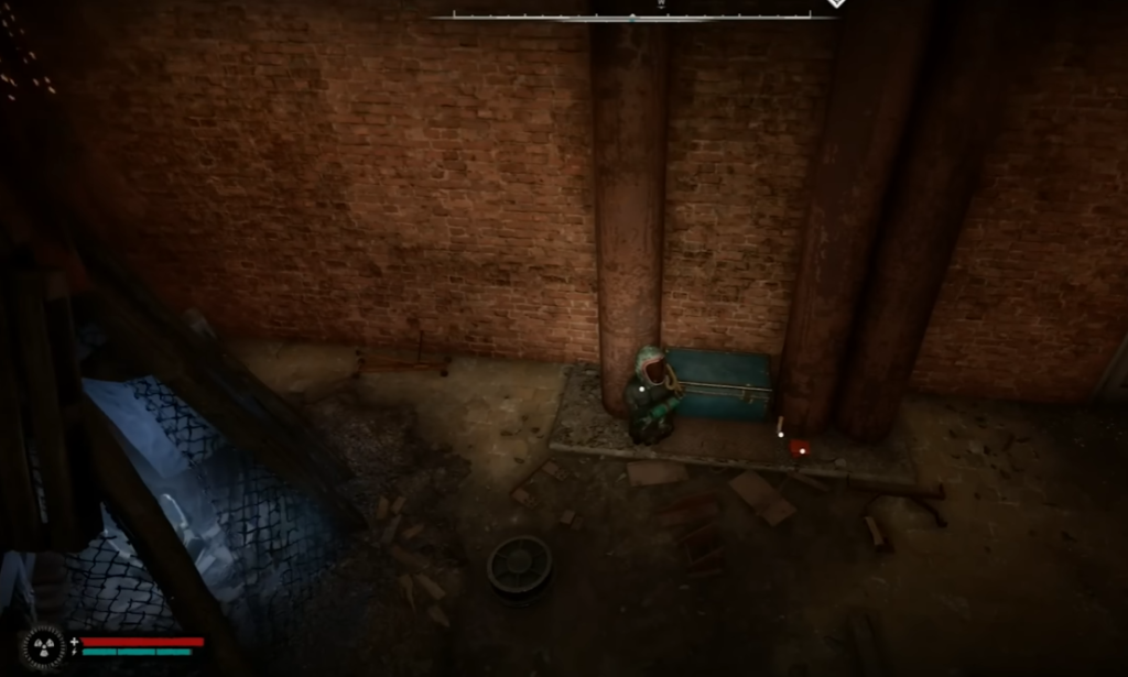 Hooded figure crouching by bench in alley