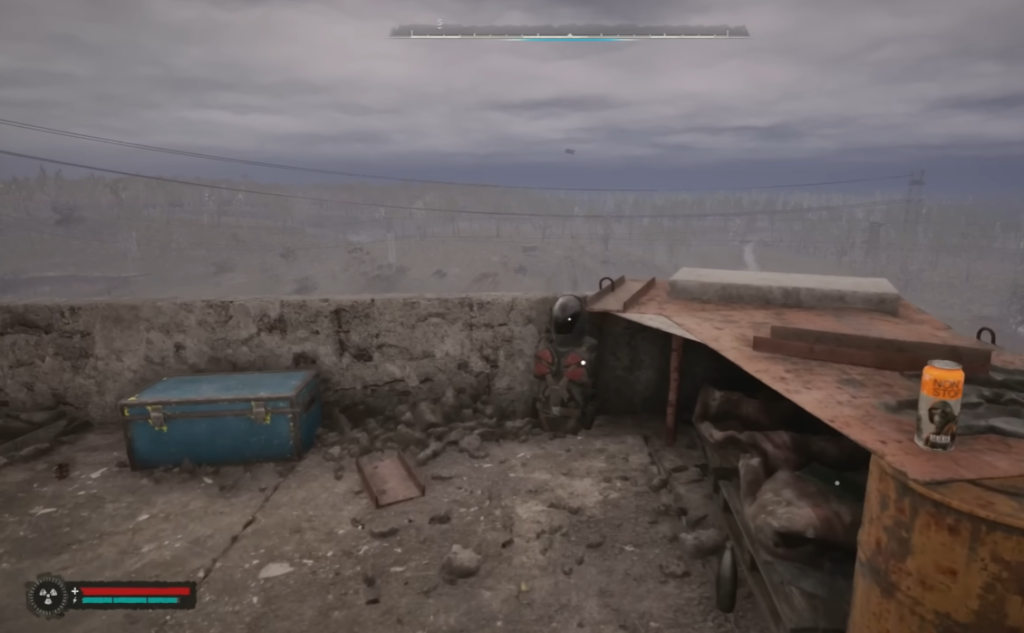 Soldier crouches behind wall on rooftop