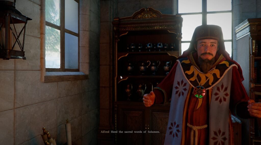 Bearded priest speaking inside stone room by window