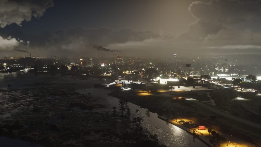 City lights glowing under storm clouds at night