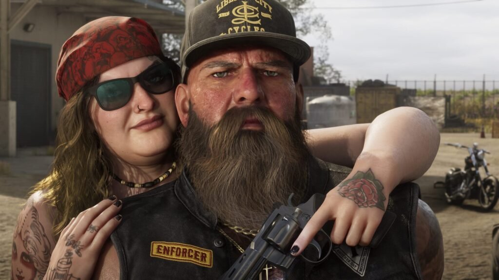 Woman hugs bearded biker holding revolver in yard
