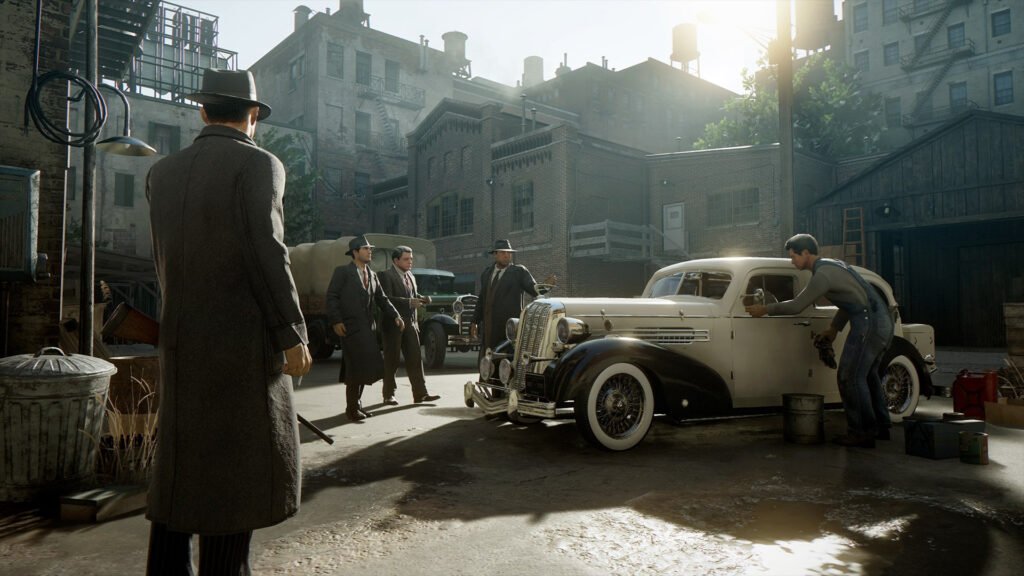 Gangsters watch mechanic cleaning white vintage car in alley