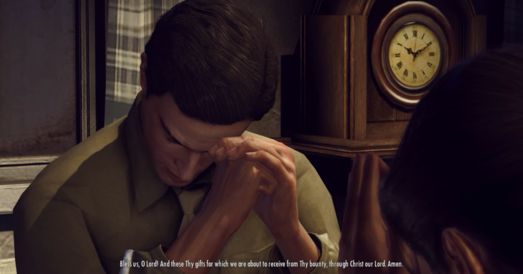 Man praying with hands clasped together.
