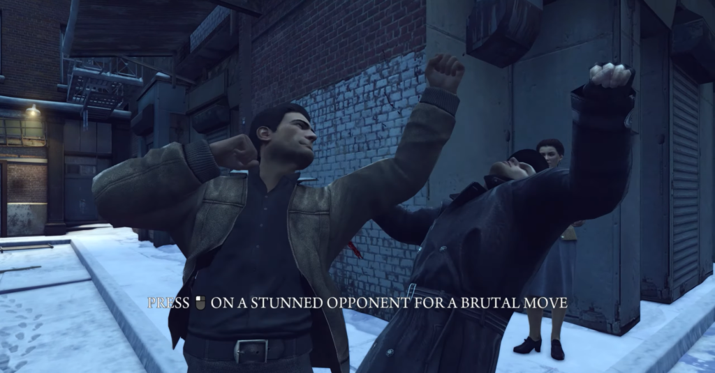 Man punches opponent in snowy alley.