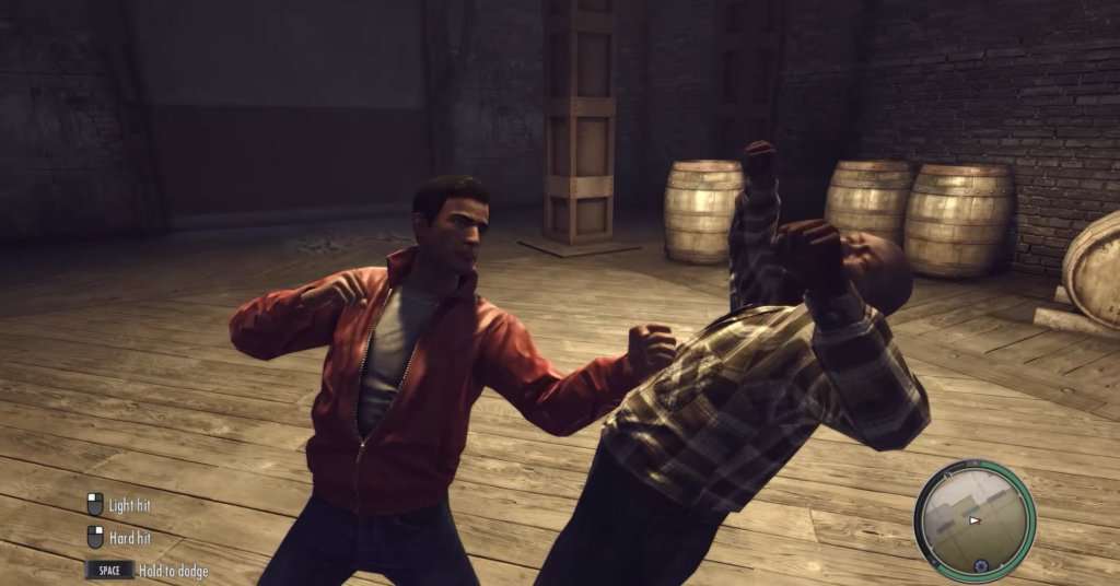 Man in red jacket punches opponent.