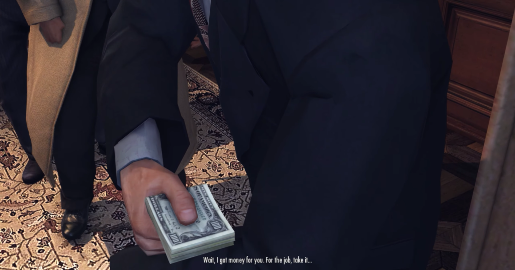 Man in suit holding cash bundle.