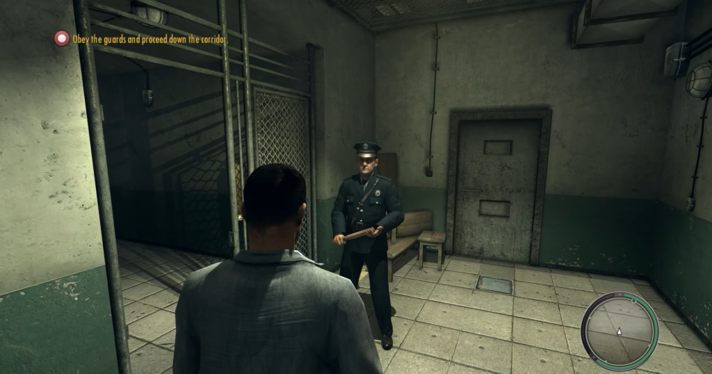 Man in suit facing police officer.