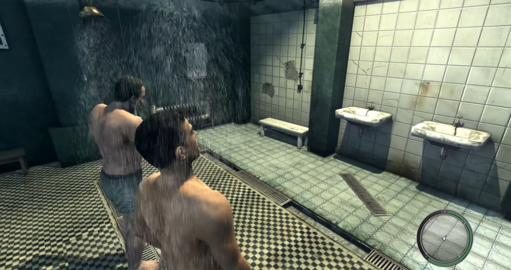 Two men showering in tiled bathroom.