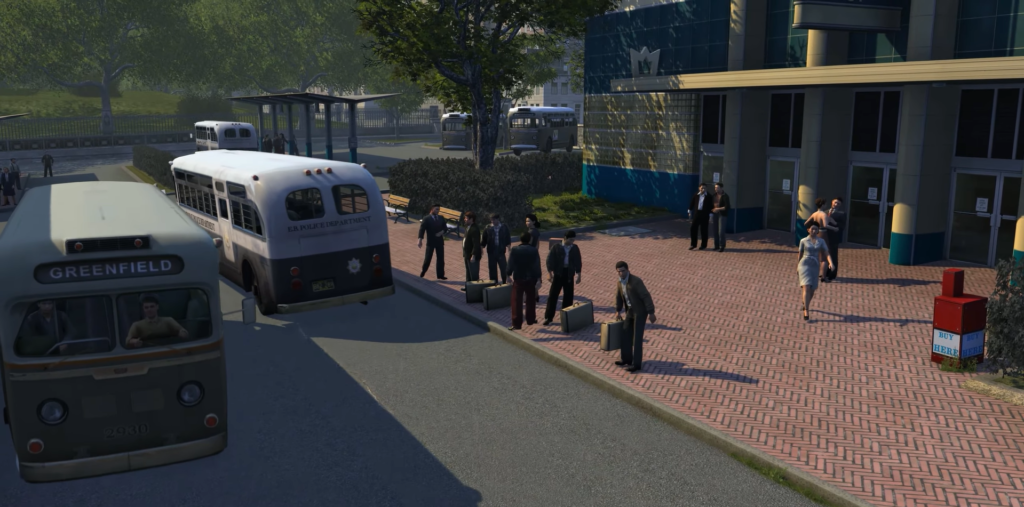 Passengers boarding bus outside terminal.