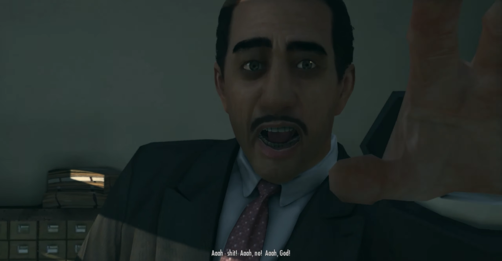 Man in suit shouting, hand raised.