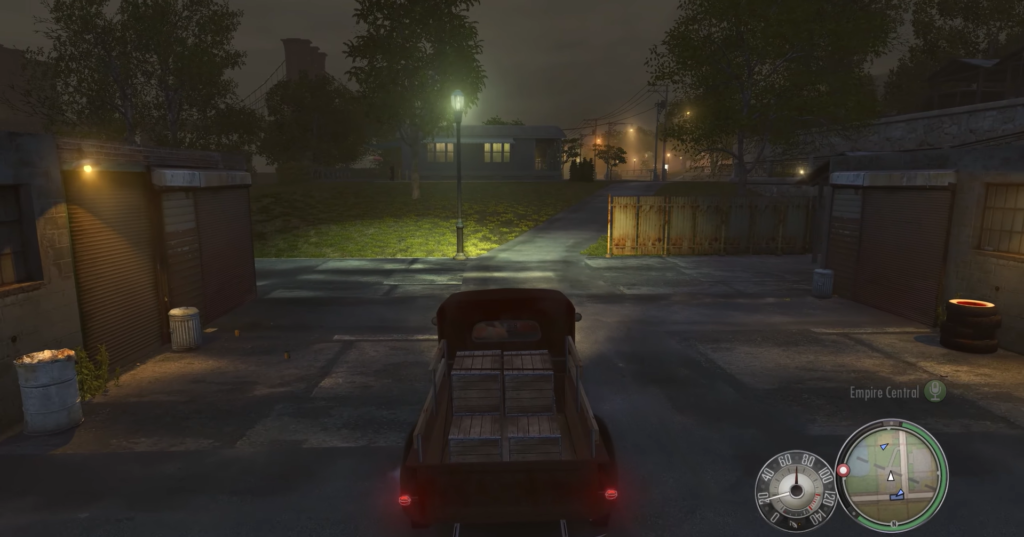 Truck parked on dimly lit street.