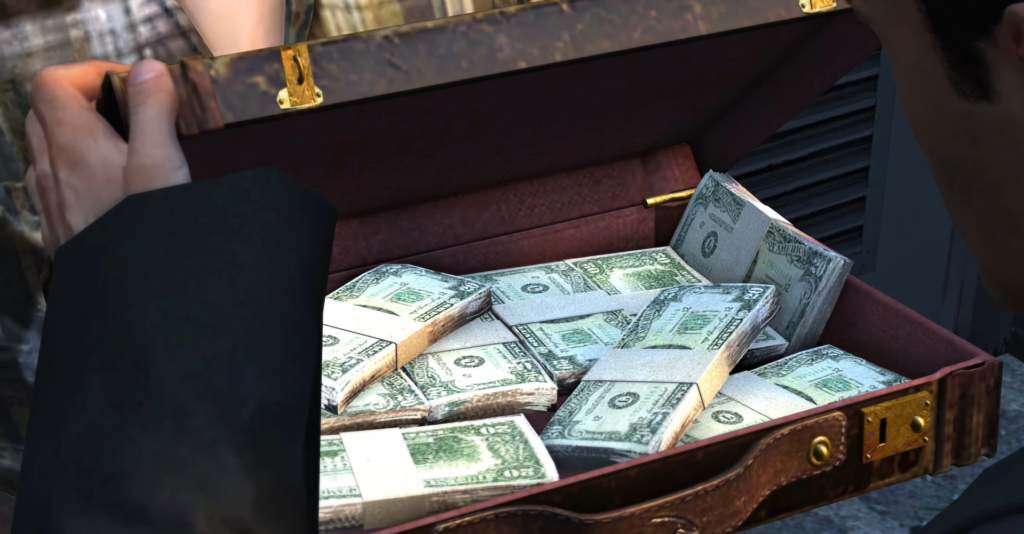 Open briefcase filled with cash bundles.