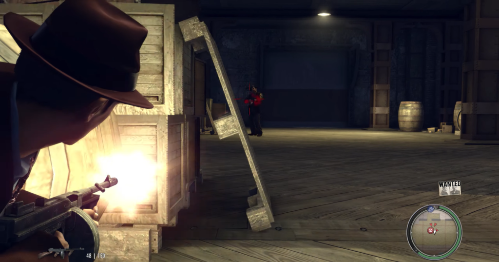 Man in brown hat shooting from cover.