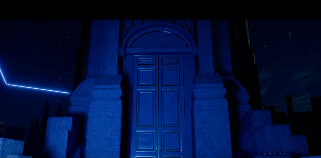 Blue double doors on stone building at night