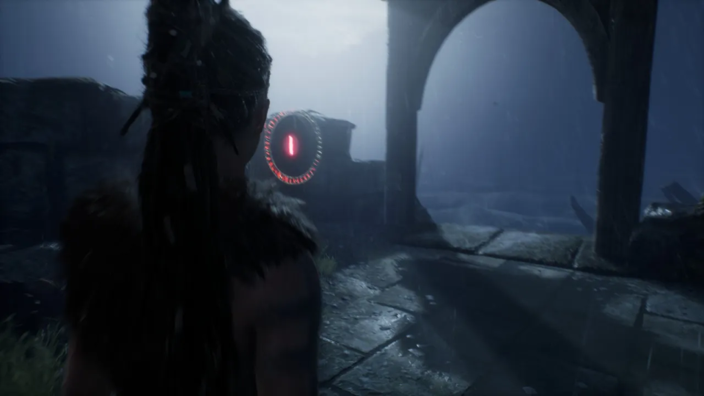 Woman faces glowing red rune in stone ruins