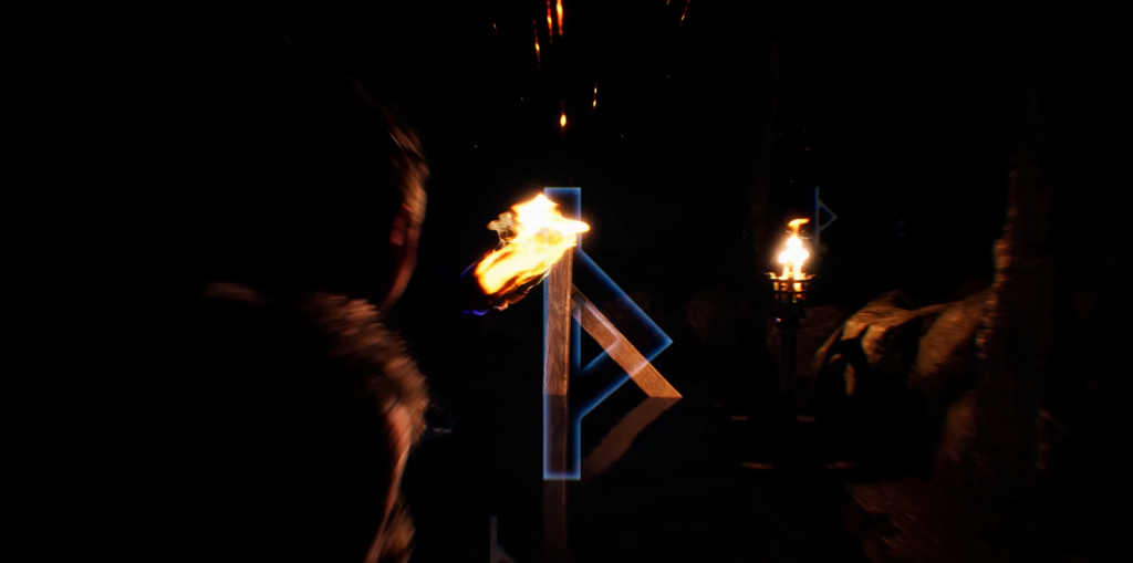 Glowing blue rune symbol burning in dark cave
