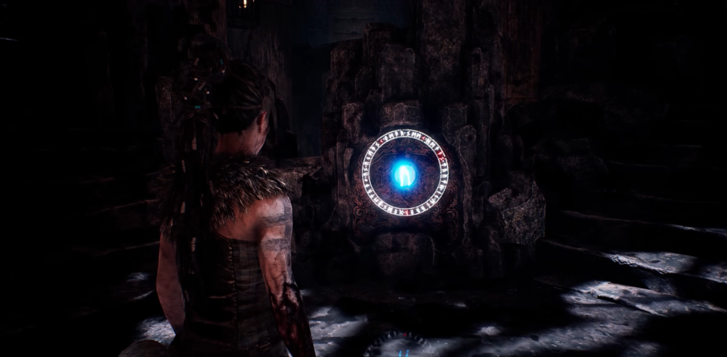 Senua from Hellblade facing glowing blue rune door
