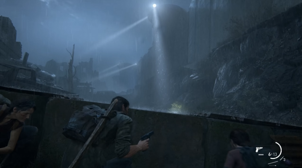 Joel crouches with pistol in rainy ruins, The Last of Us