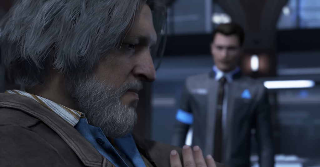 Hank Anderson sits in foreground, Connor stands behind