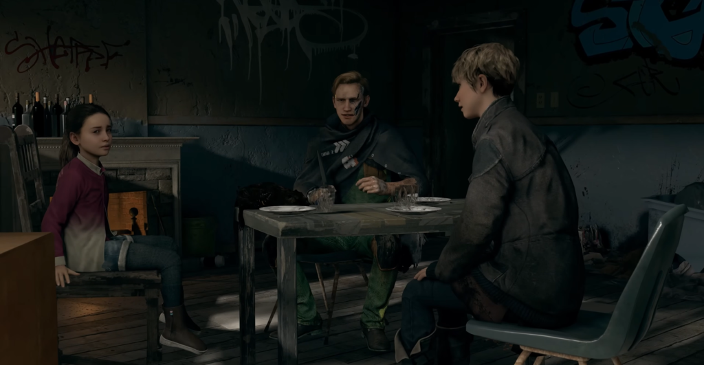 Three people sit at table in graffiti room