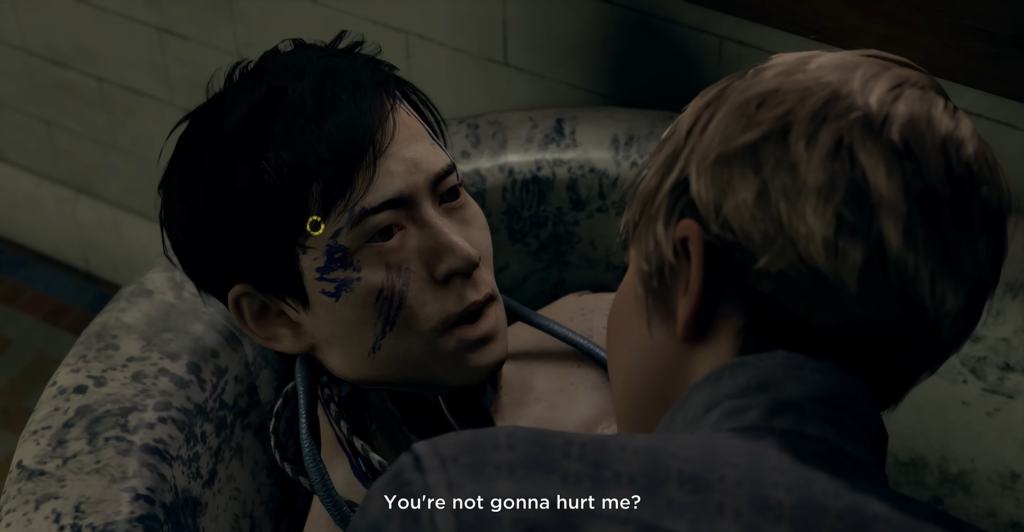 Two men talk in a bathtub indoors
