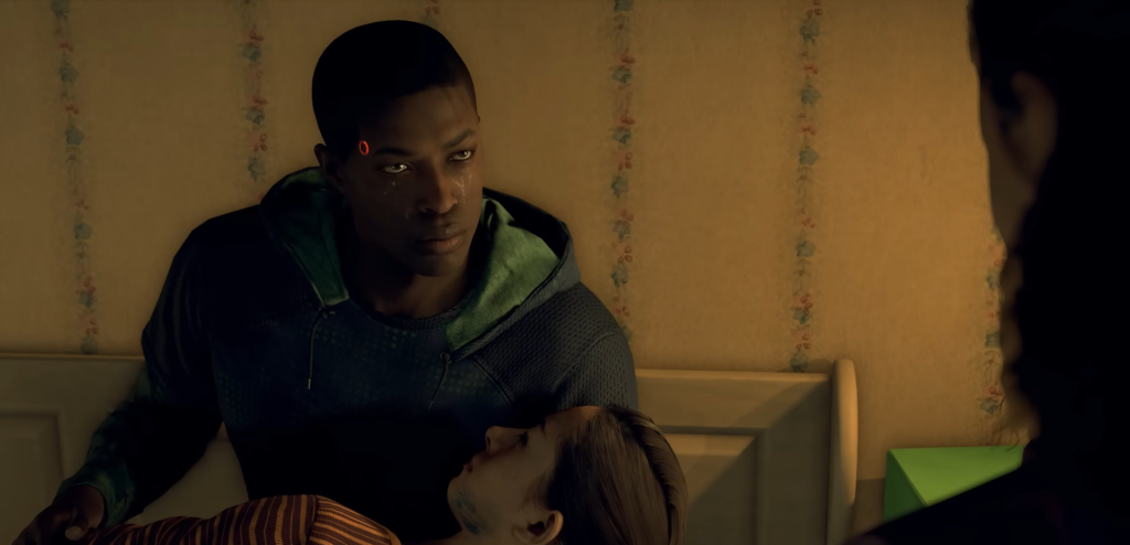 Markus holding injured man on bed indoors