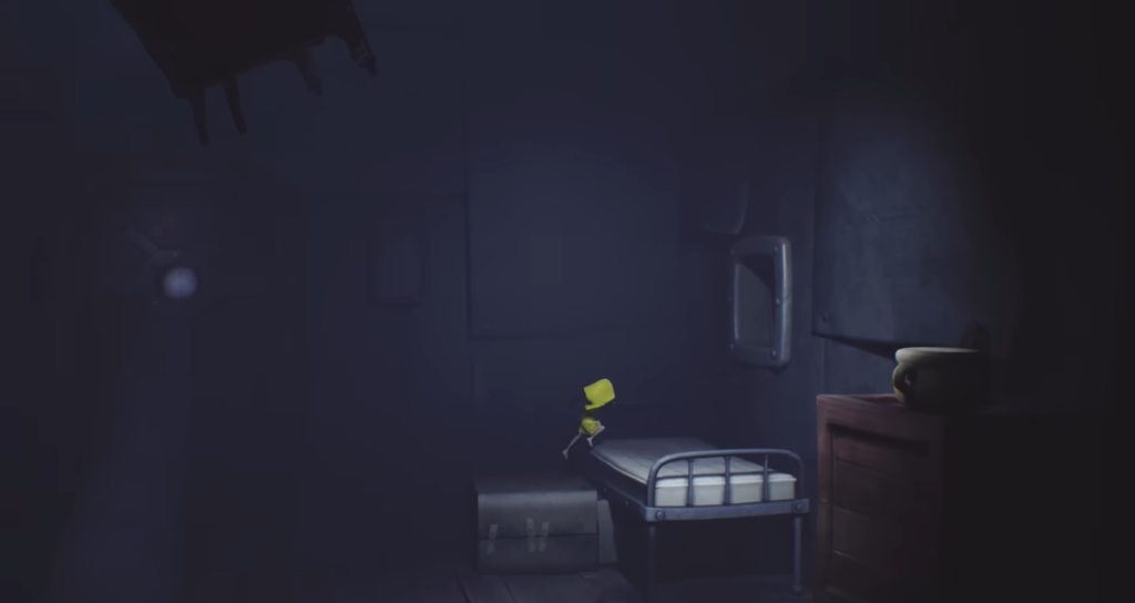 Six from Little Nightmares stands on bed in room