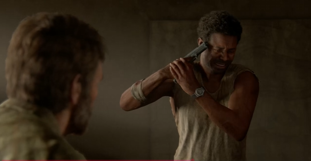 Henry holding gun to head in room, Uncharted 4