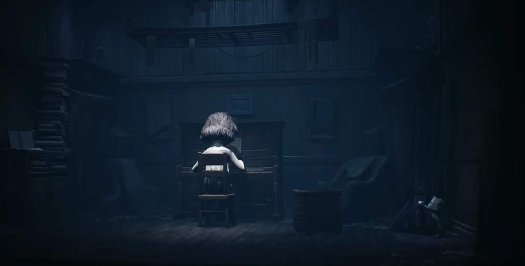 Six from Little Nightmares II playing piano indoors