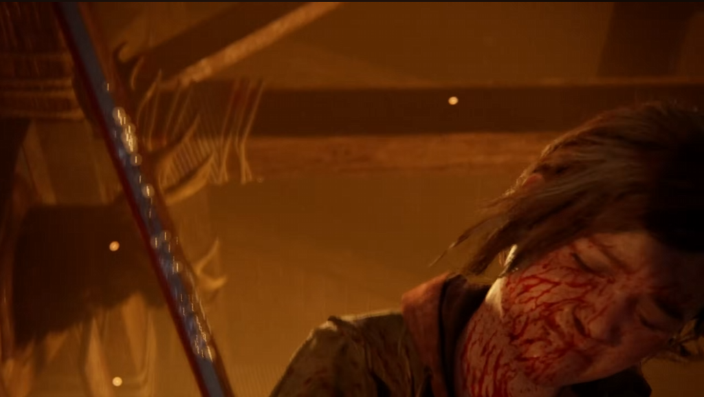 Bloodied woman leaning forward in orange-lit room