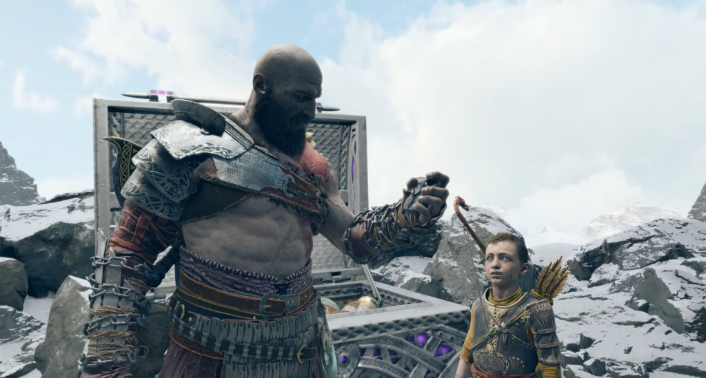 Kratos holds object beside Atreus in snowy mountains