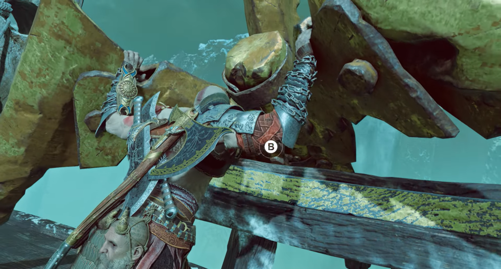 Kratos pushes golden statue in God of War