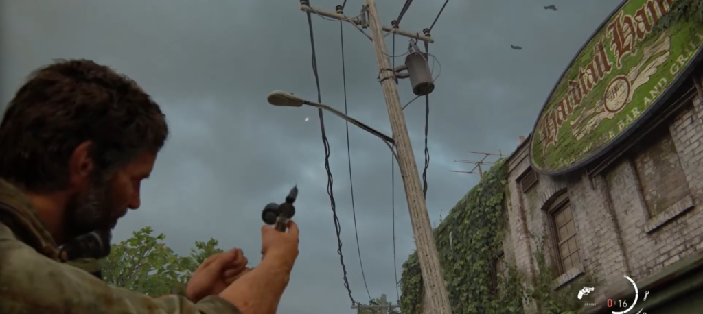 Man aiming revolver near ivy-covered building and power lines