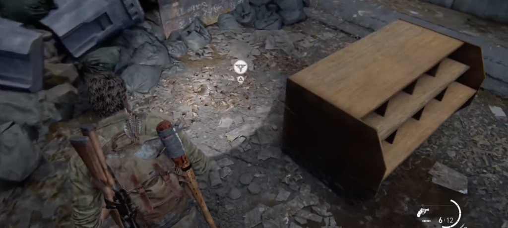 Player character aiming flashlight at debris in ruined room