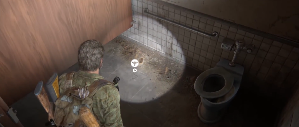 Joel aims flashlight in bathroom, The Last of Us