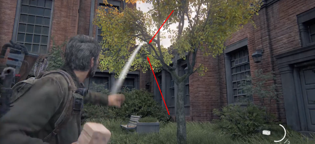 Joel throws a brick at a tree courtyard