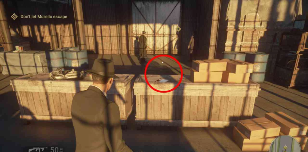 Mafia III player aims at crates in warehouse