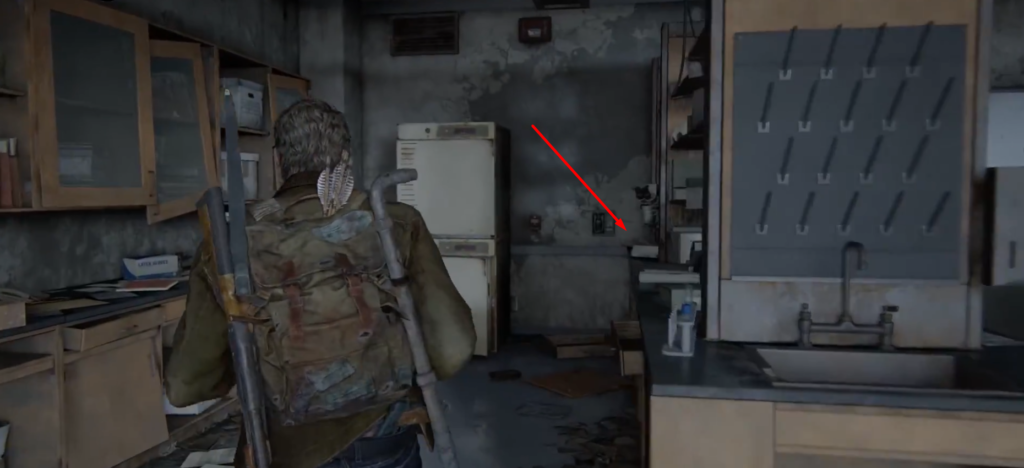 Joel carrying backpack in abandoned lab room