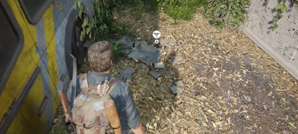 The Last of Us Joel walking beside yellow bus