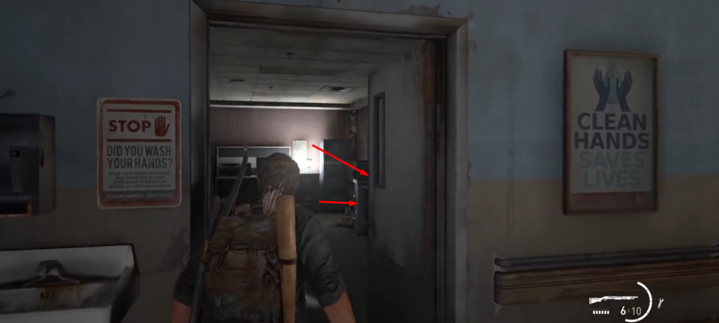 Joel walking through hospital doorway in The Last of Us