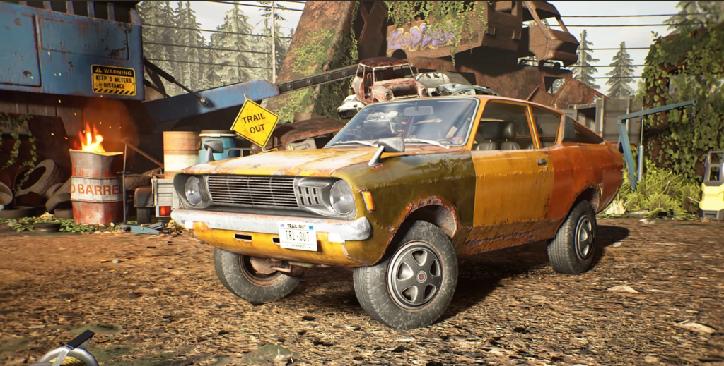 Rusty orange car parked in scrapyard garage
