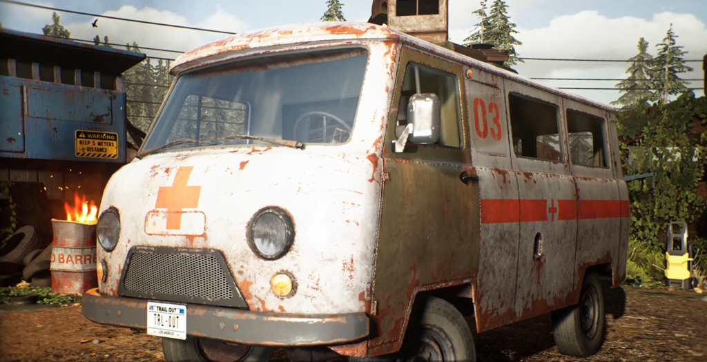 Rusty white ambulance van parked in scrapyard