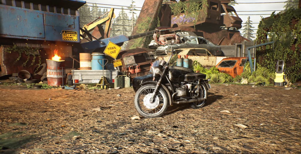 Black motorcycle parked in scrapyard with stacked cars