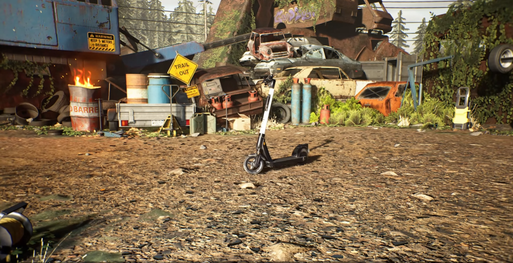 Electric scooter standing on dirt in scrapyard