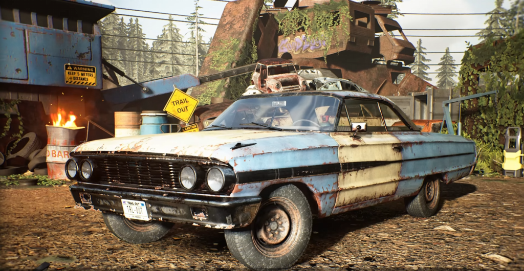 Rusty blue car parked in scrapyard setting