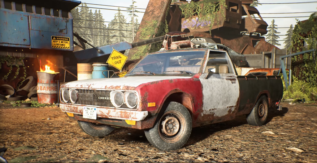 Rusty red and white pickup parked in scrapyard